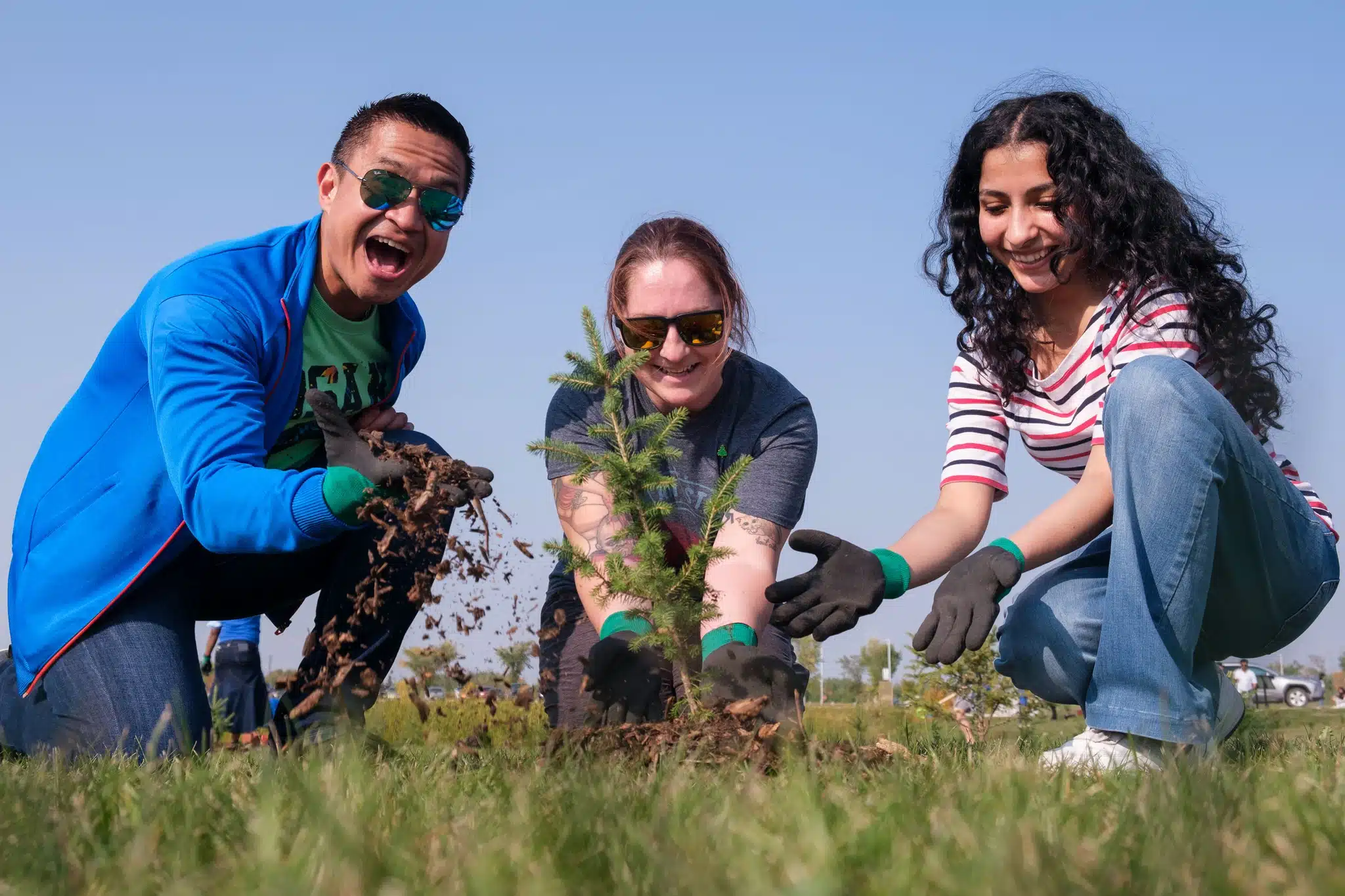 Getting excited… volunteers join in widescale tree plantings across Canada on National Tree Day. (Photo credit Tree Canada).
