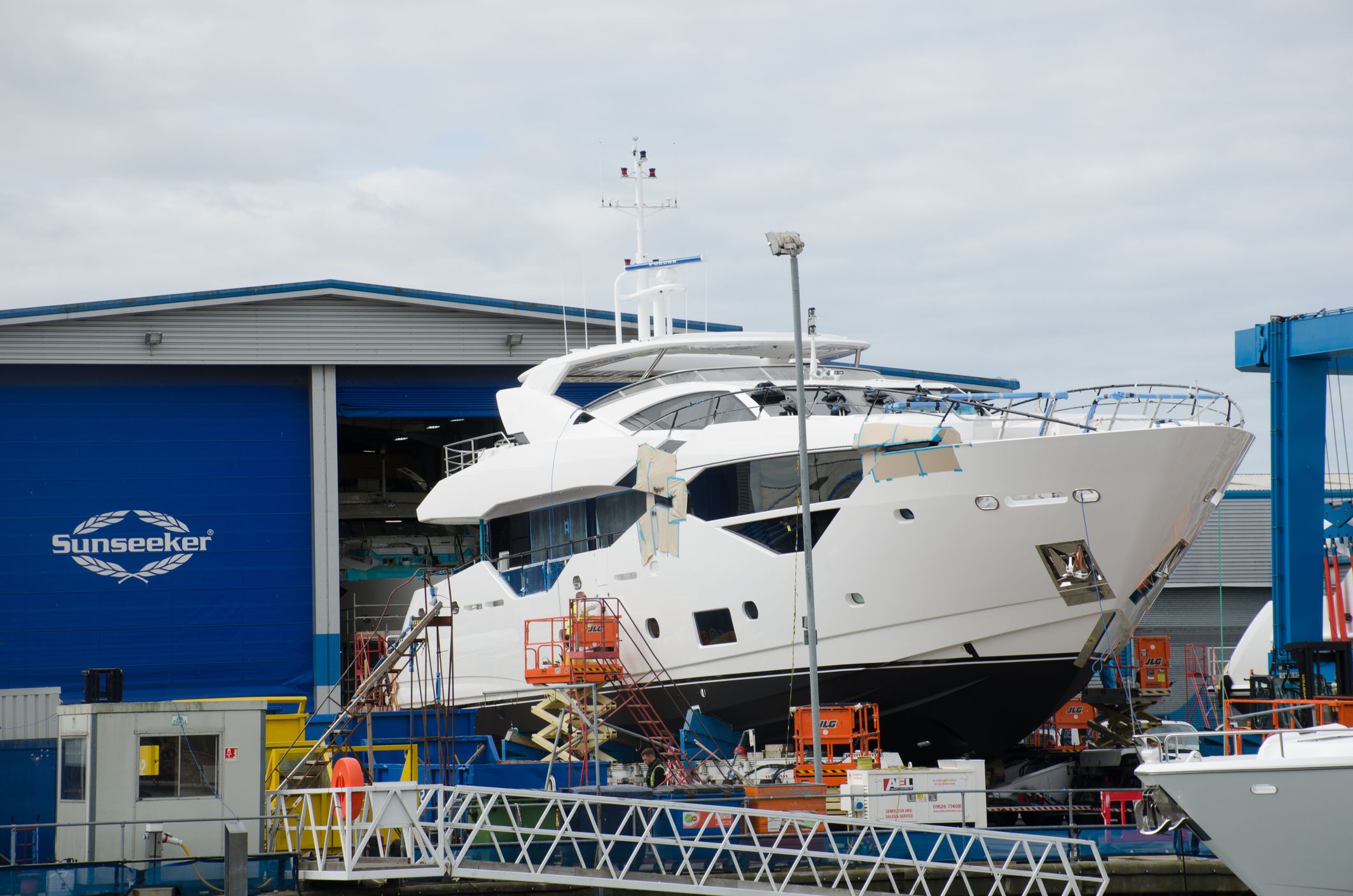 Sunseeker, one of the world's largest boatbuilders, has been fined in a historic case for breaches of the UK Timber Regulation (Stock Photo ID: 2337165693)