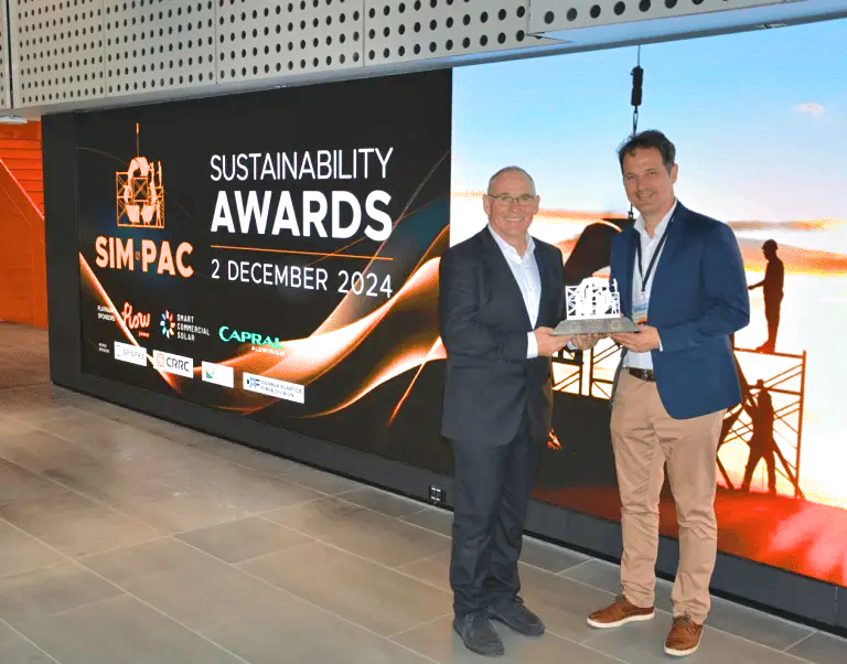 Geoff Matthews presents Matt de Jongh (on behalf of Responsible Wood) the SIM-PAC Primary Sector Sustainability Award.