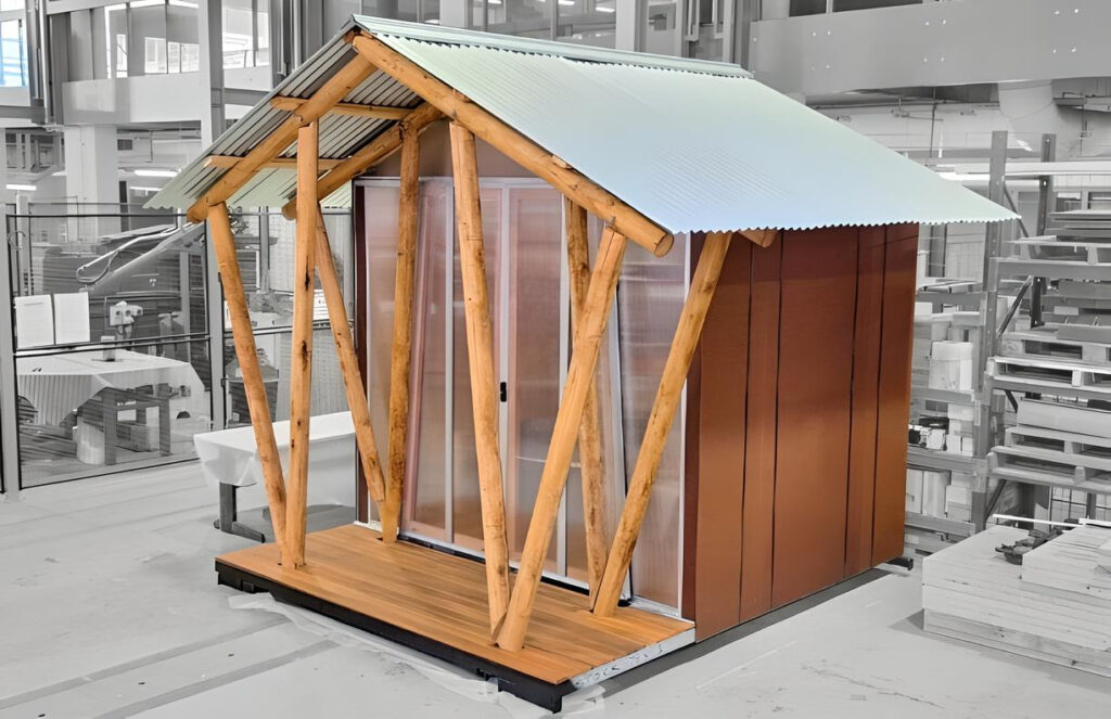 The project, which is a collaboration between Southern Cross University and the University of Queensland, has developed two systems - a hybrid timber-cardboard sandwich panels using cardboard 'studs' bonded to radiata pine plywood, hoop pine plywood, particleboard, and MDF, as well as thinning and pulpwood structural elements, which uses low diameter roundwood and residues to frame and clad the walls.