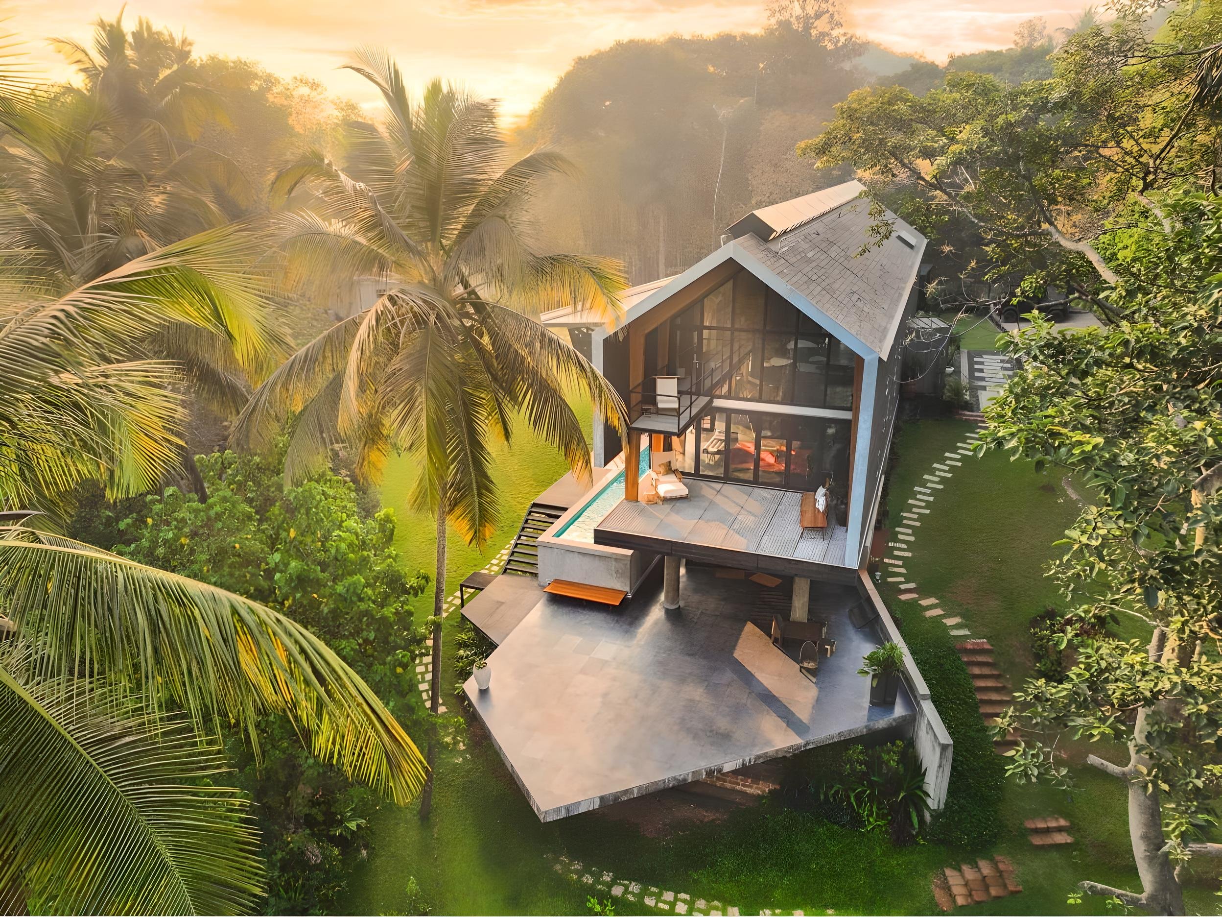 Framed in mass timber, a first in India, this house for Sahil Barua, the co-founder of Delhivery designed by Architecture Discipline is wrapped in charred wood panels to blend into its forested surroundings. (Photo Credit: Studio Charuau)