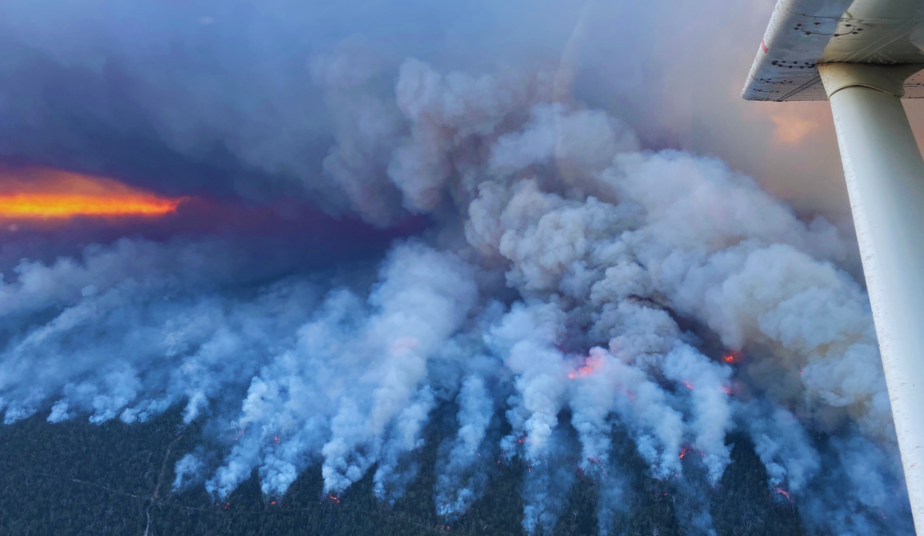 Sunset aerial ignition of 9,000 ha prescribed burn. (Photo Credit: Supplied by Brad Barr)