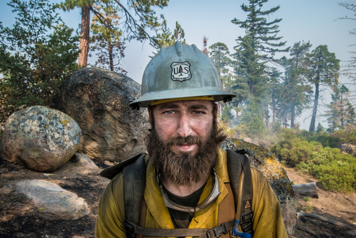 U.S. Department of Agriculture (USDA) Forest Service (FS) Forestry Technicians like Clyde Carroll mitigate trail hazards by clearing pathways blocked by dead and fallen trees and brush, thus allowing other crews to better get in and out of the area to help fires in and around National Parks. (Photo Credit: USDA Photo by Lance Cheung, Original public domain image from Flickr, Free Public Domain image for Personal and Business use. U.S. Government Content)