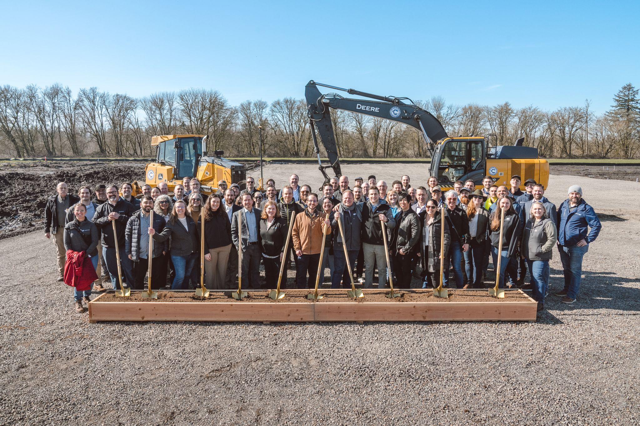 Timberlab executives with construction partners, Oregon State officials, and local mass timber experts breaking ground at the CLT facility site.