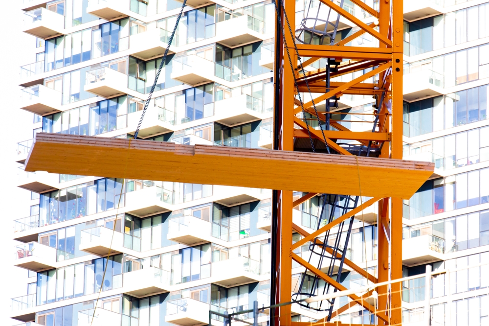 According to Corgan, one of the world's largest architectural firms, the environmental upside for mass timber is enormous. The report reveals that under a worse case slash scenario, a 6-six-storey timber building (with 54,400 cubic feet in framing, 46,980 cubic feet in flooring and 9,860 cubic feet in columns) will have a better carbon footprint than a conventional steel and concrete framed building. (Photo Credit: Asset id: 2226396725 via Shutterstock Images)